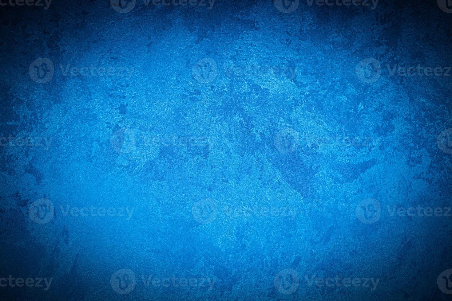Texture of blue decorative plaster or concrete with vignette. photo