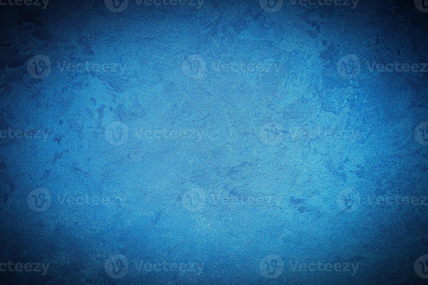 Texture of blue decorative plaster or concrete with vignette. photo