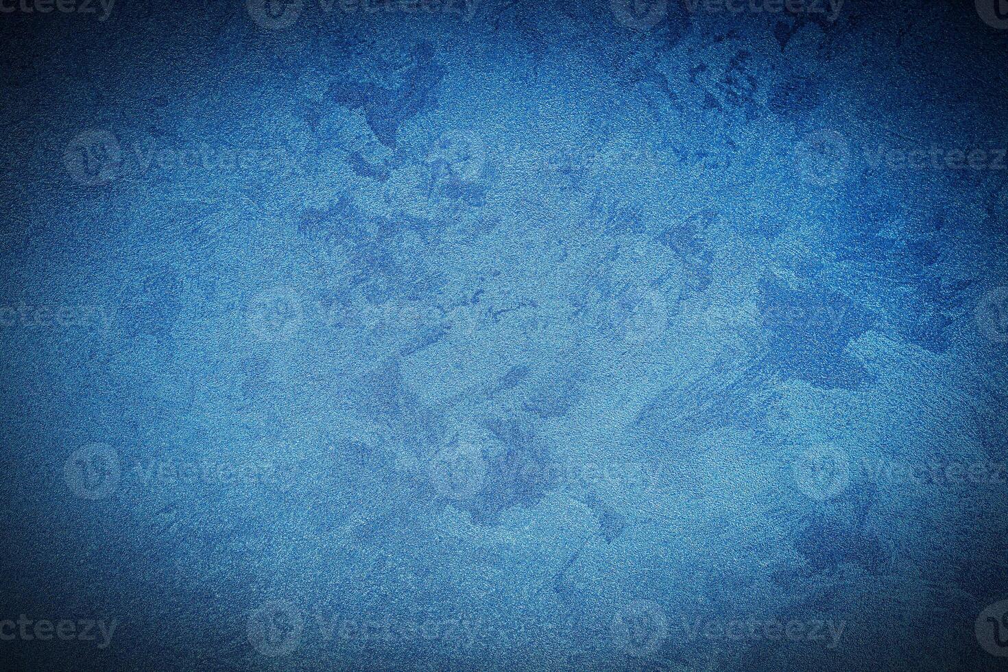 Texture of blue decorative plaster or concrete with vignette. photo