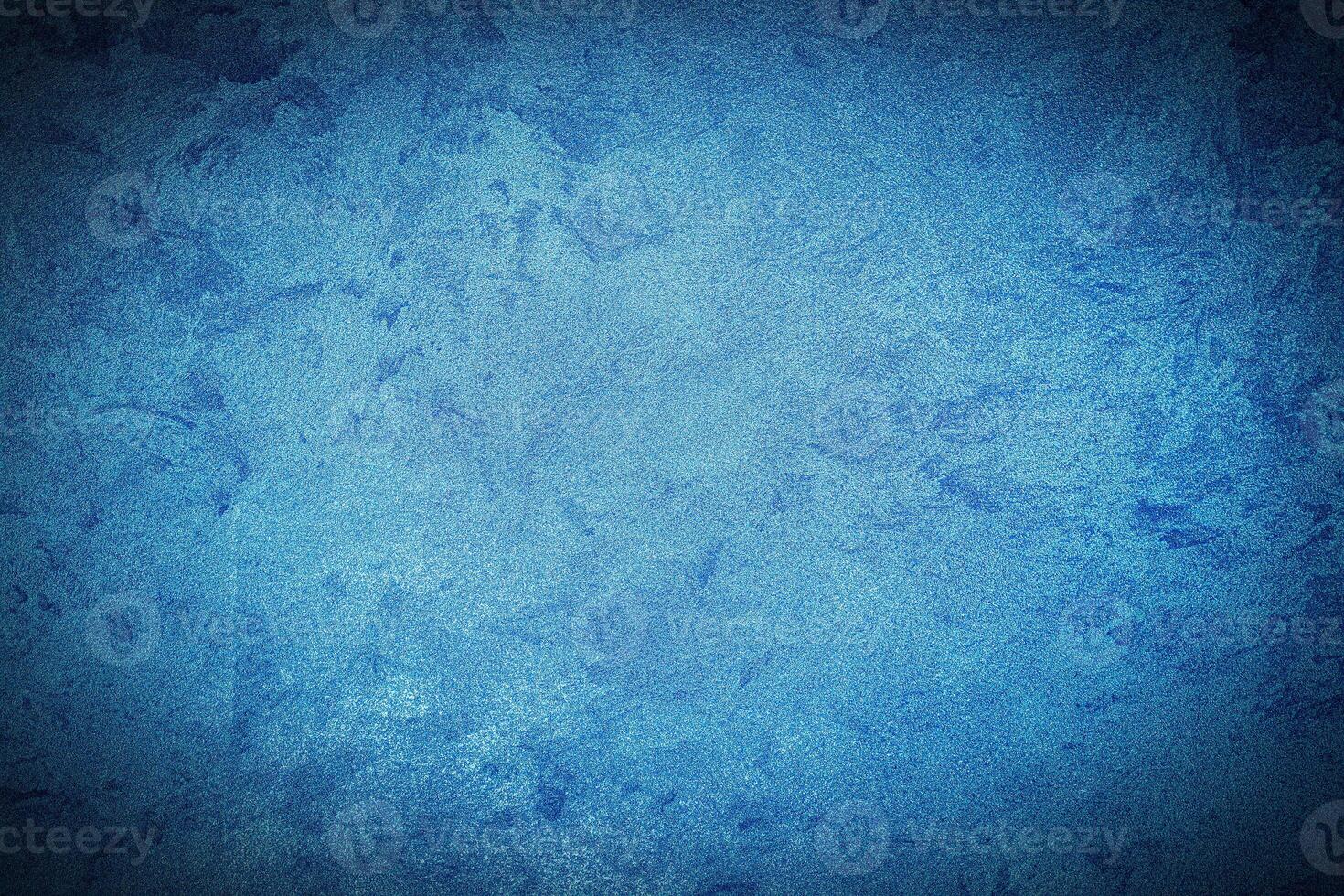 Texture of blue decorative plaster or concrete with vignette. photo