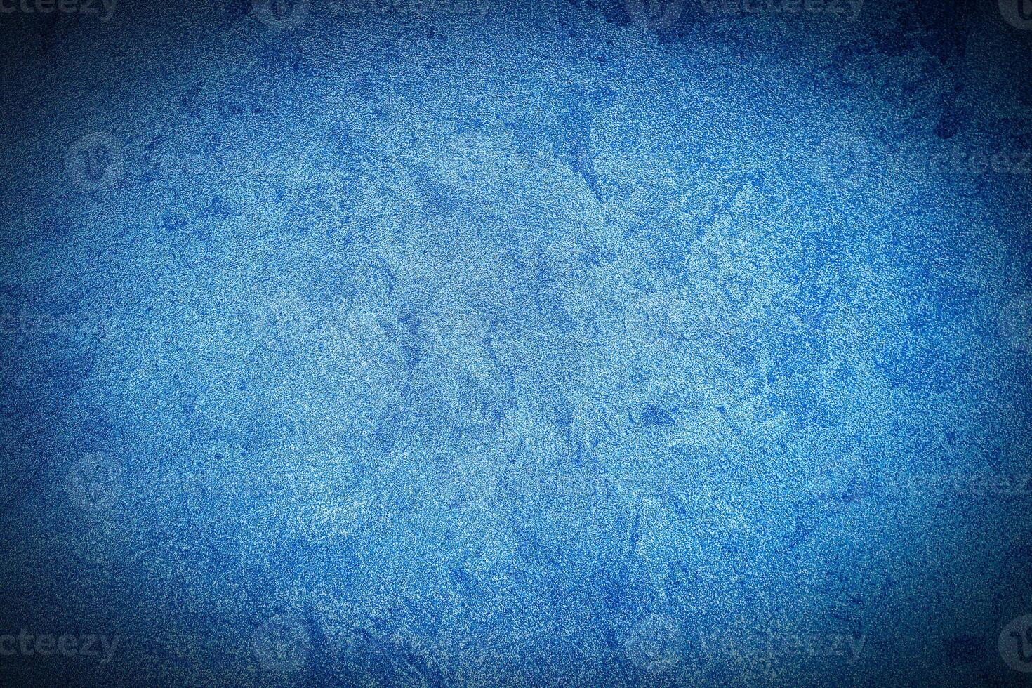 Texture of blue decorative plaster or concrete with vignette. photo