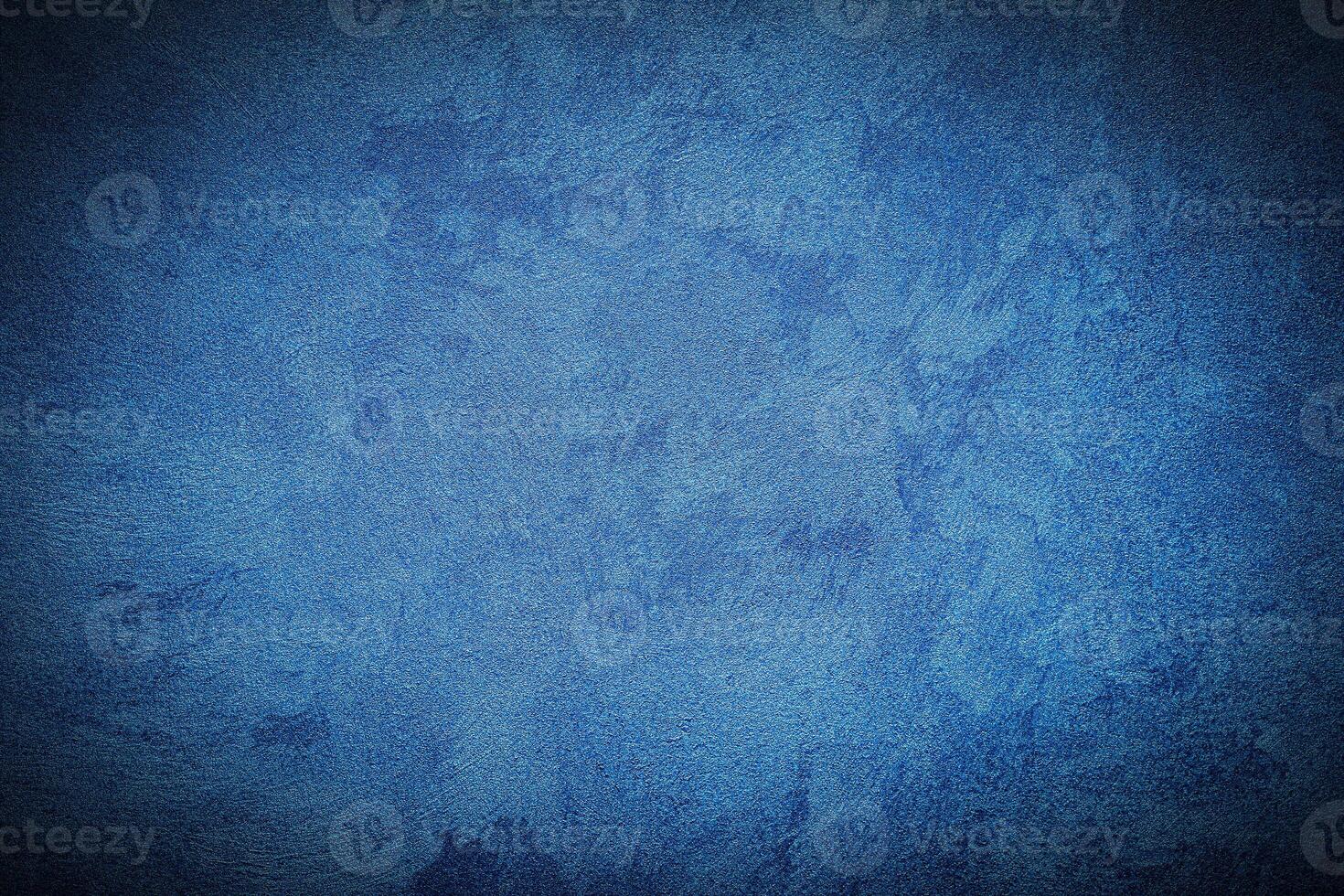 Texture of blue decorative plaster or concrete with vignette. photo