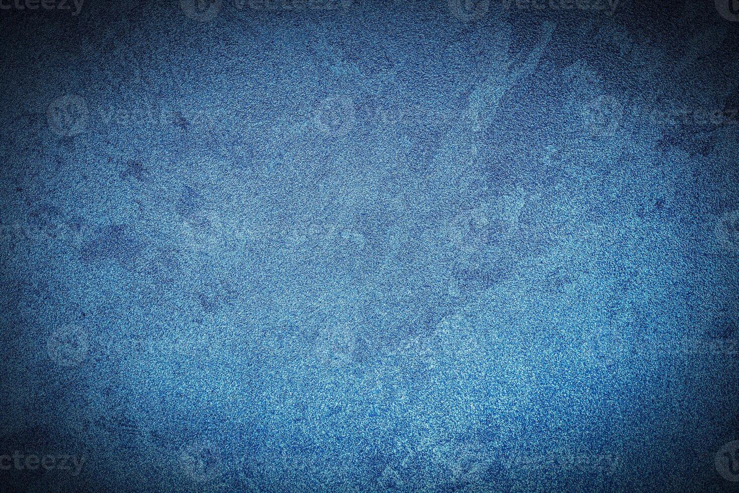 Texture of blue decorative plaster or concrete with vignette. photo