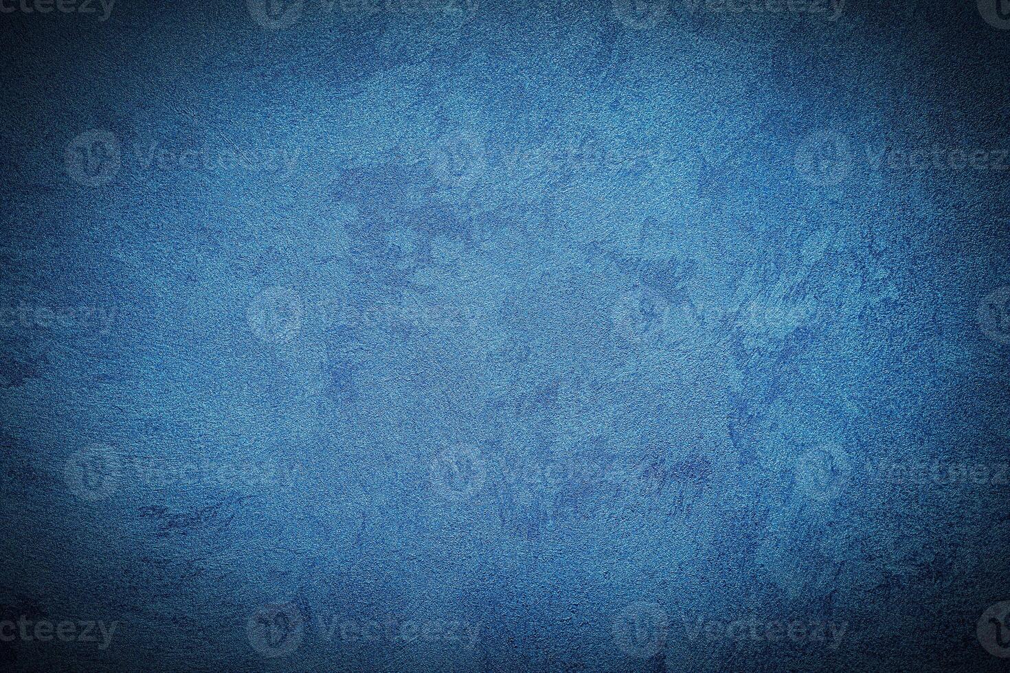 Texture of blue decorative plaster or concrete with vignette. photo