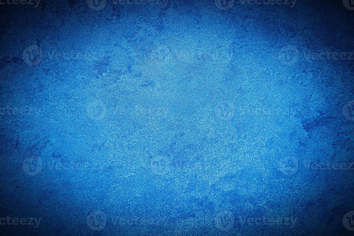 Texture of blue decorative plaster or concrete with vignette. photo