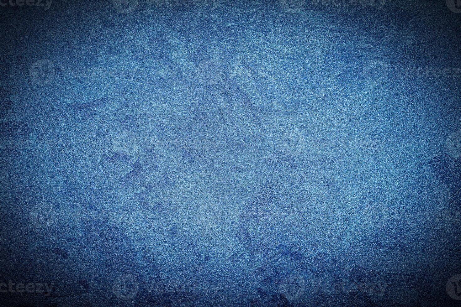 Texture of blue decorative plaster or concrete with vignette. photo