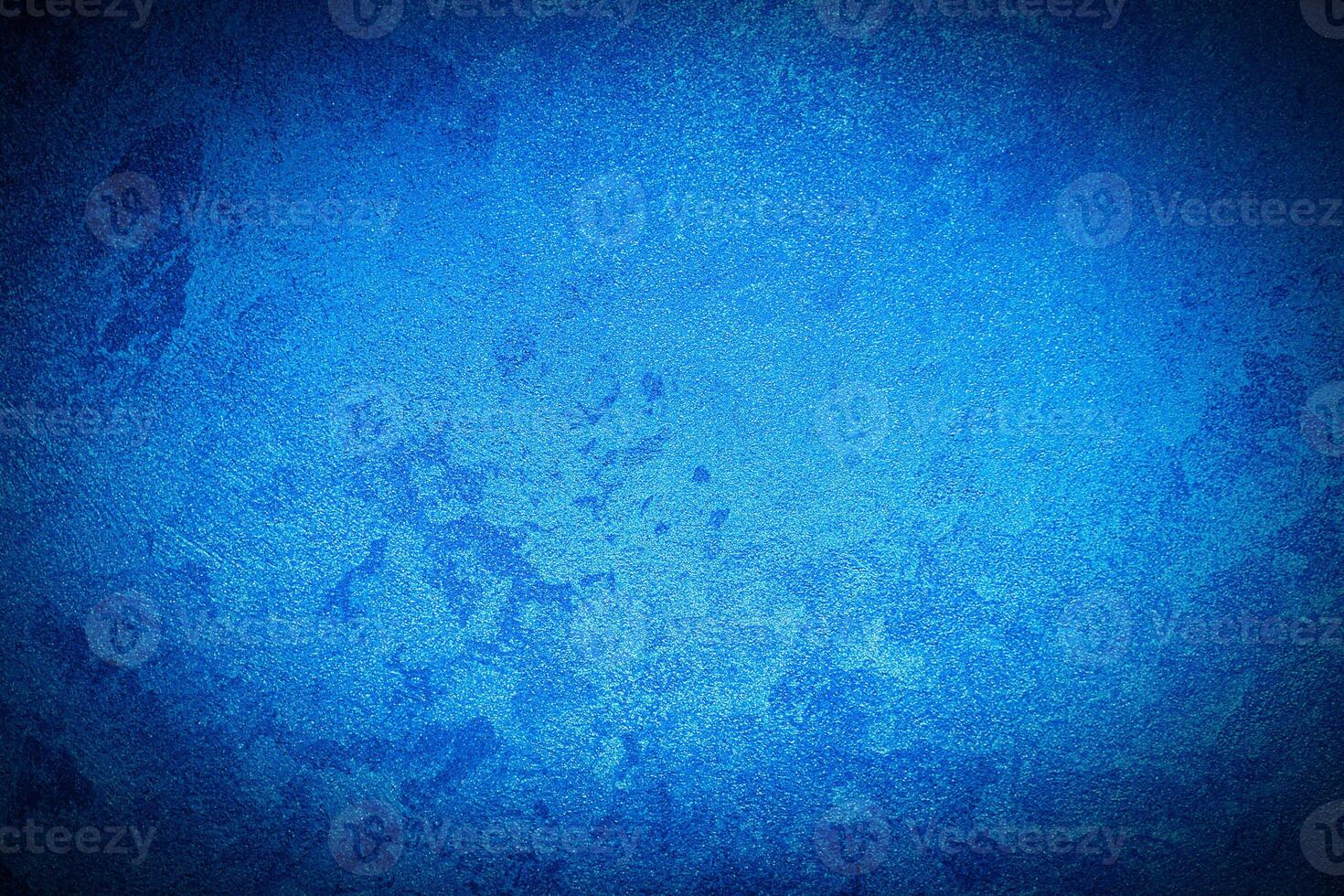 Texture of blue decorative plaster or concrete with vignette. photo