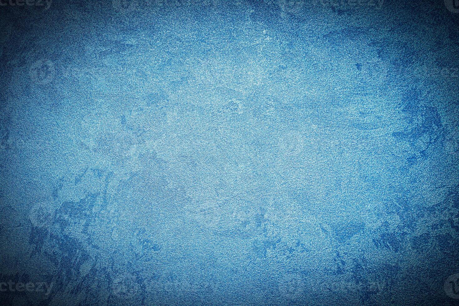 Texture of blue decorative plaster or concrete with vignette. photo