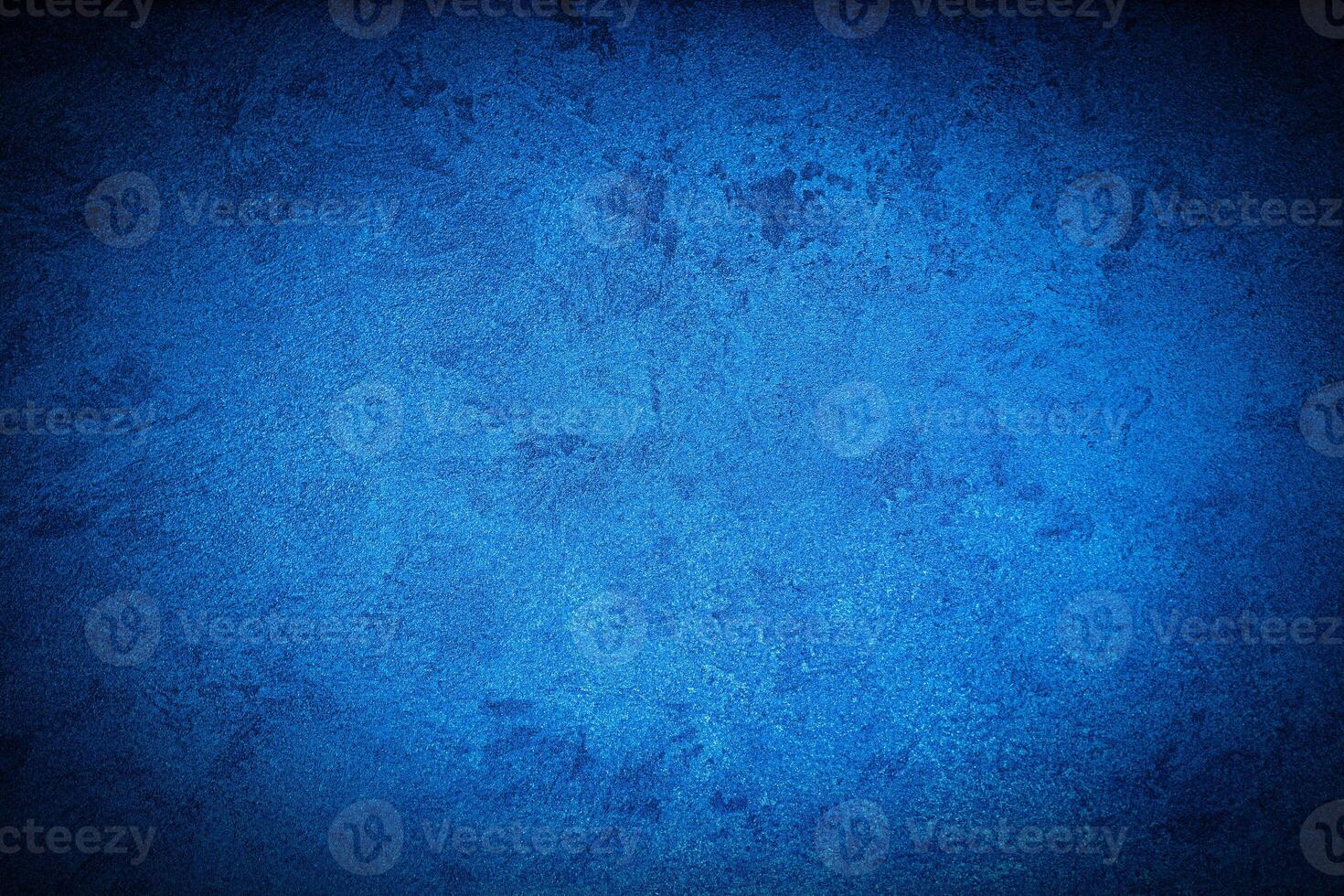 Texture of blue decorative plaster or concrete with vignette. photo