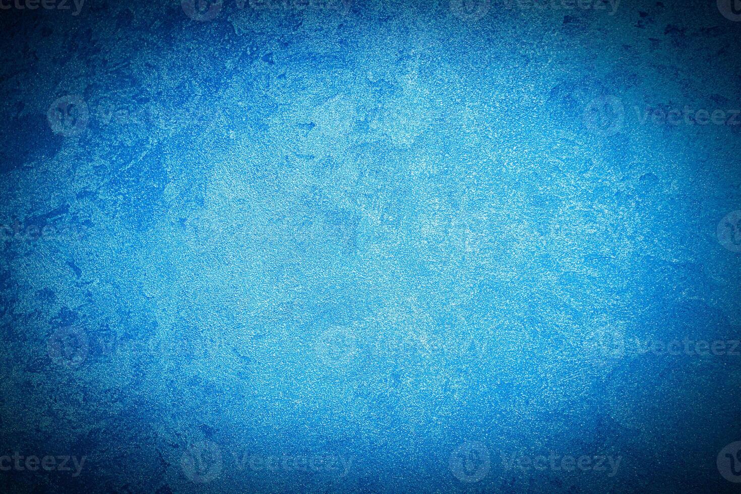 Texture of blue decorative plaster or concrete with vignette. photo