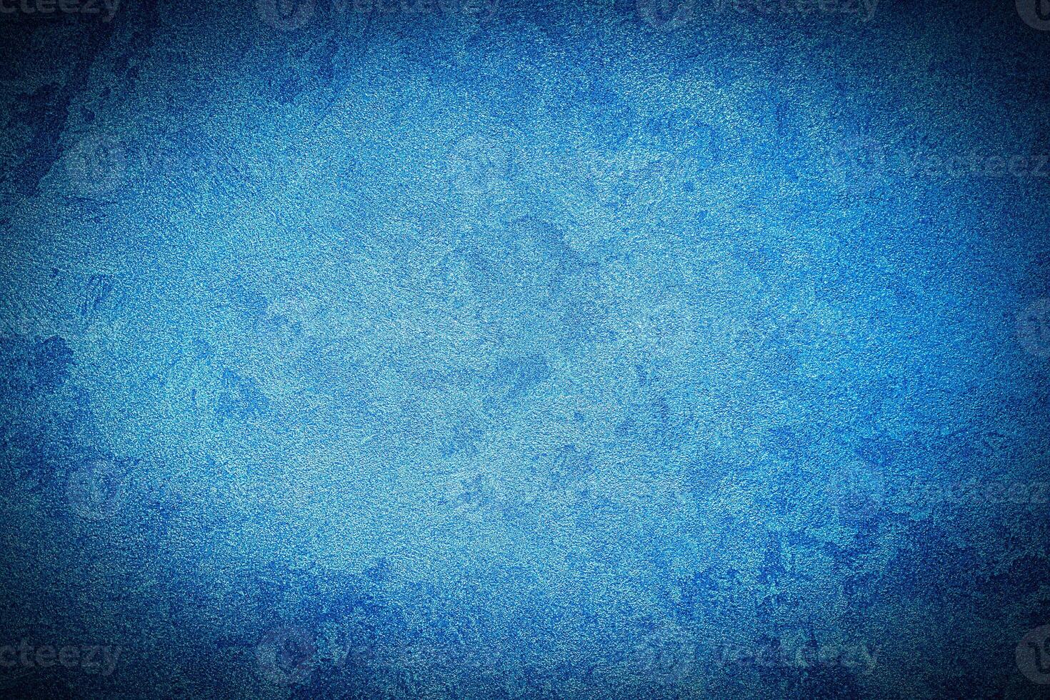 Texture of blue decorative plaster or concrete with vignette. photo