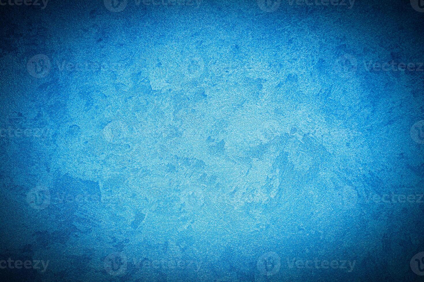 Texture of blue decorative plaster or concrete with vignette. photo