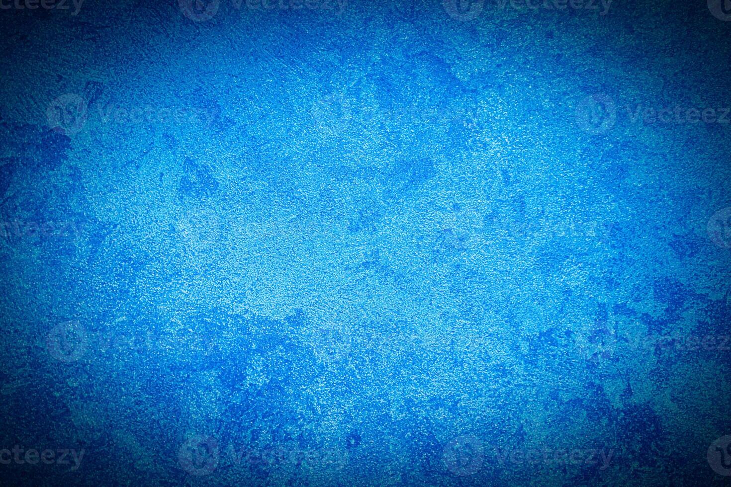 Texture of blue decorative plaster or concrete with vignette. photo