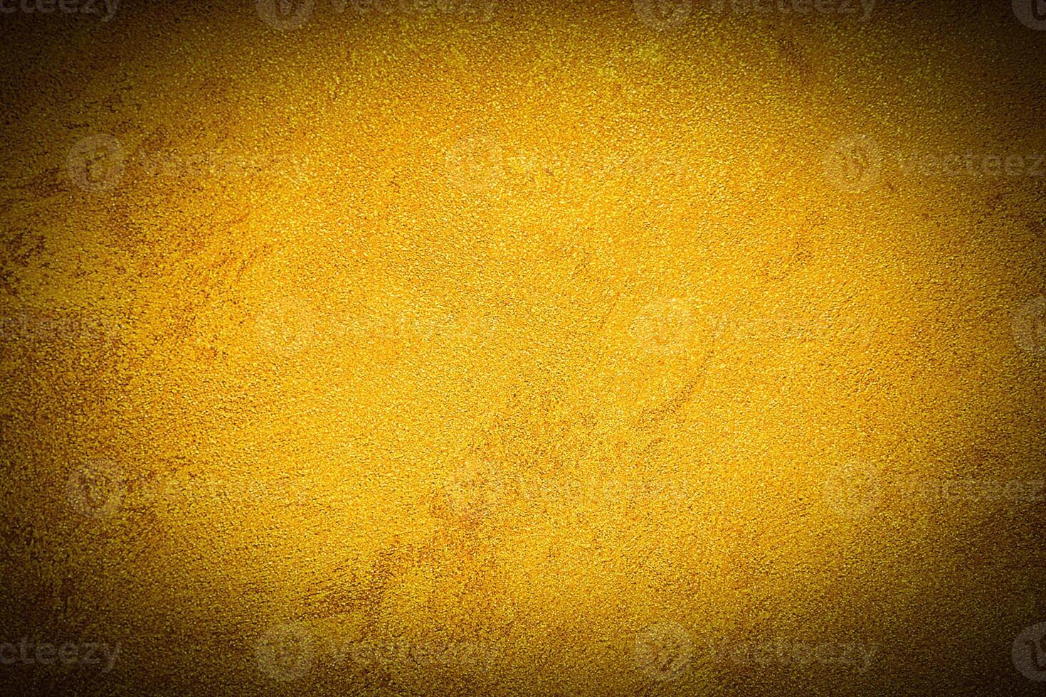 Texture of golden decorative plaster or concrete with vignette. photo