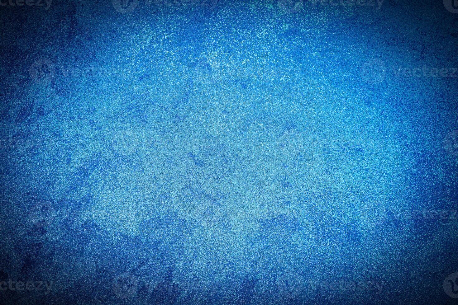 Texture of blue decorative plaster or concrete with vignette. photo