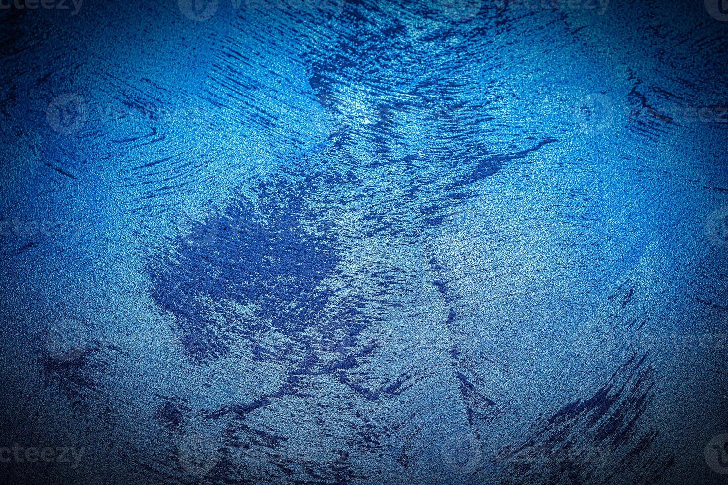 Texture of blue decorative plaster or concrete with vignette. photo