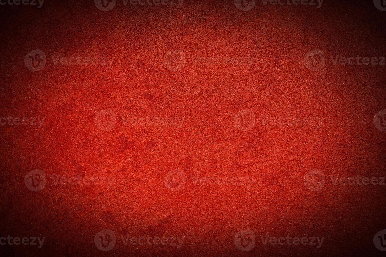 Texture of red decorative plaster or concrete with vignette. photo