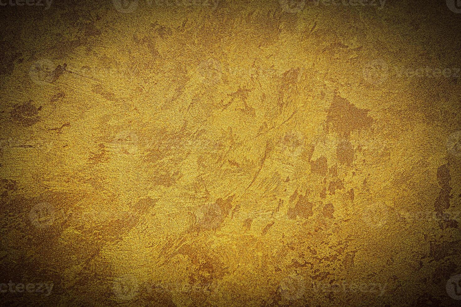 Texture of golden decorative plaster or concrete with vignette. photo