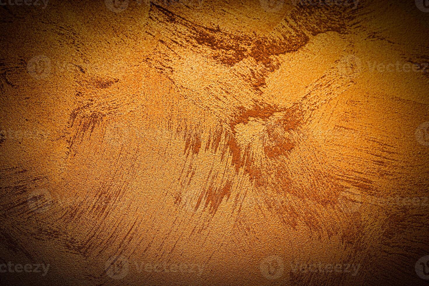 Texture of orange decorative plaster or concrete with vignette. photo