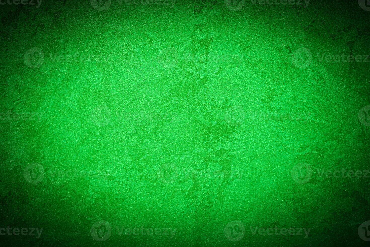 Texture of green decorative plaster or concrete with vignette. photo