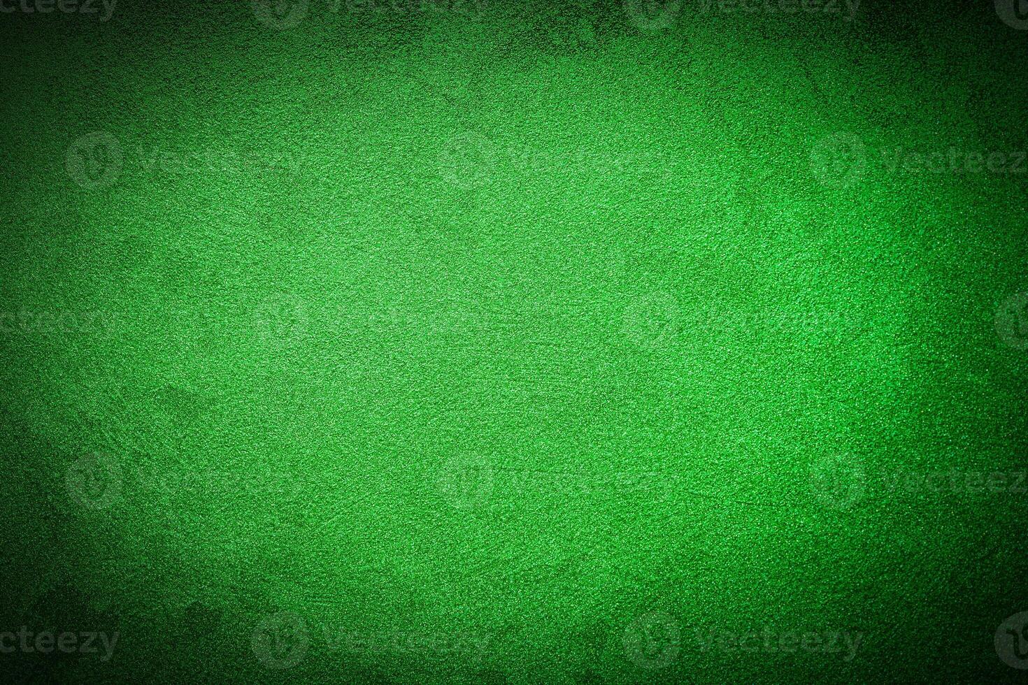 Texture of green decorative plaster or concrete with vignette. photo