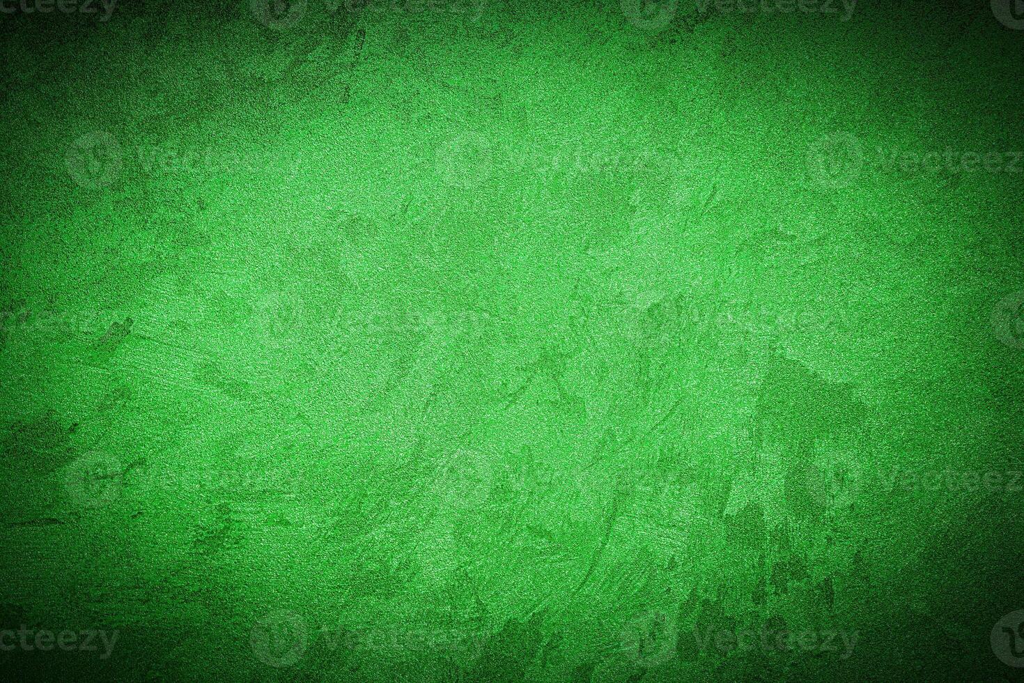 Texture of green decorative plaster or concrete with vignette. photo