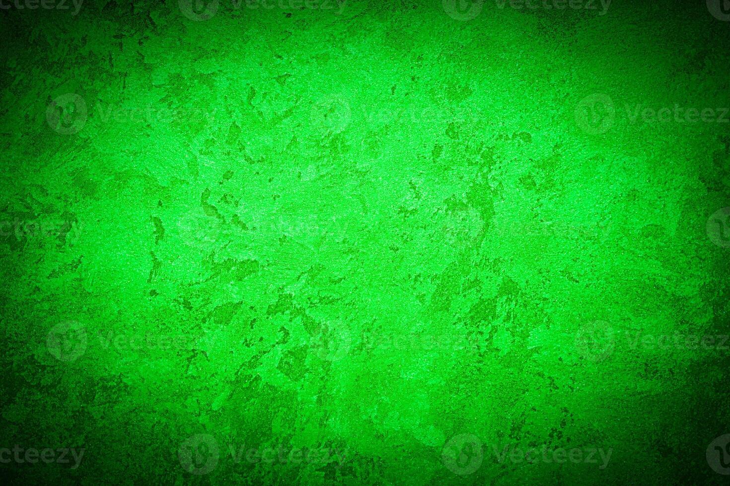 Texture of green decorative plaster or concrete with vignette. photo