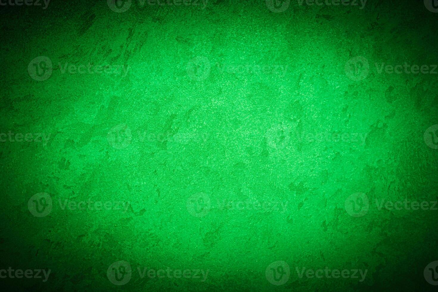 Texture of green decorative plaster or concrete with vignette. photo