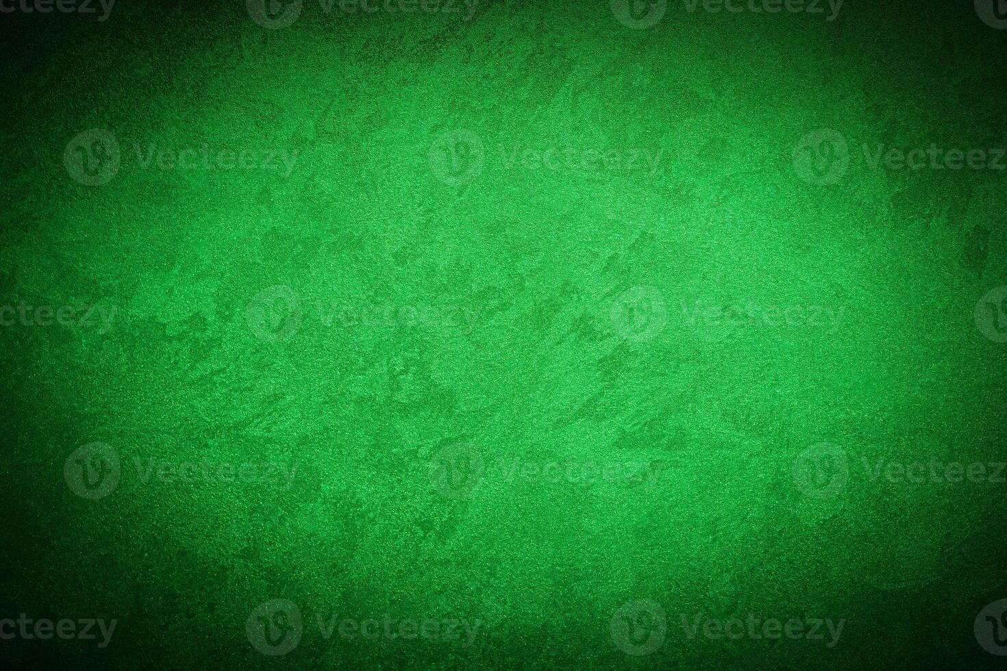Texture of green decorative plaster or concrete with vignette. photo