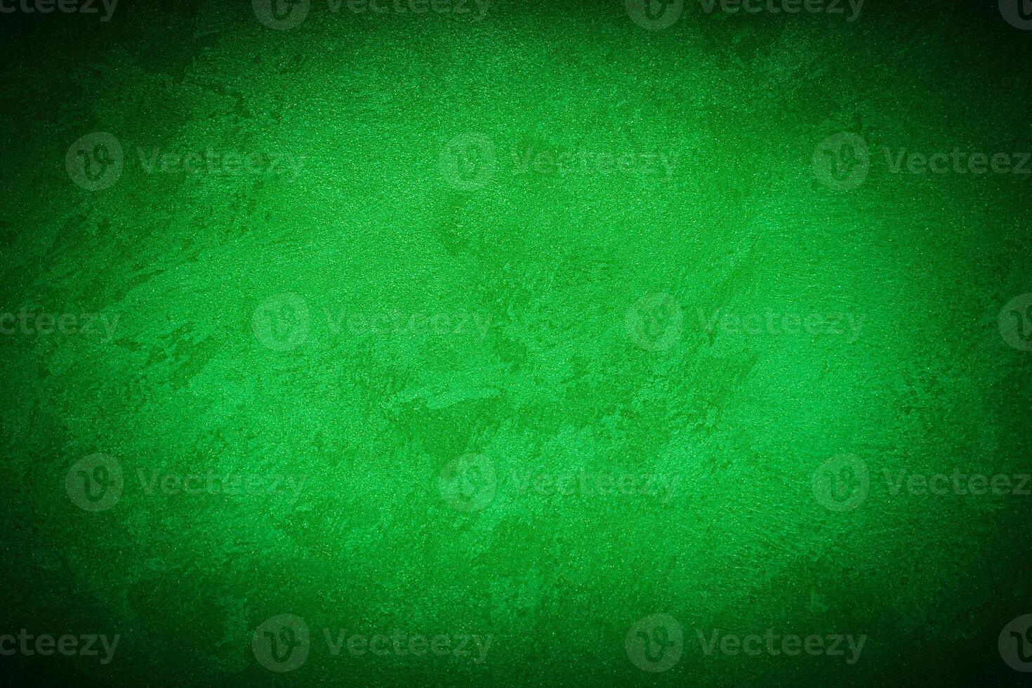Texture of green decorative plaster or concrete with vignette. photo