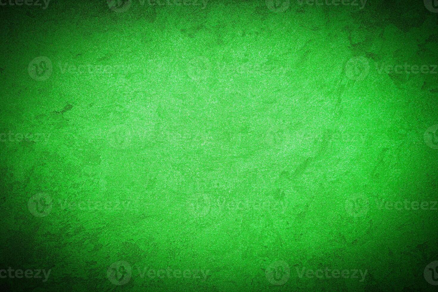 Texture of green decorative plaster or concrete with vignette. photo