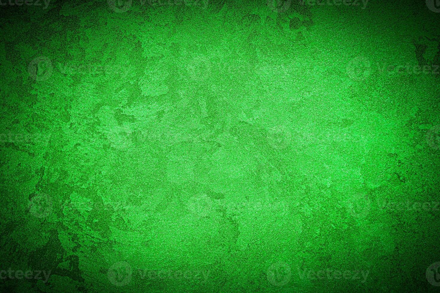 Texture of green decorative plaster or concrete with vignette. photo
