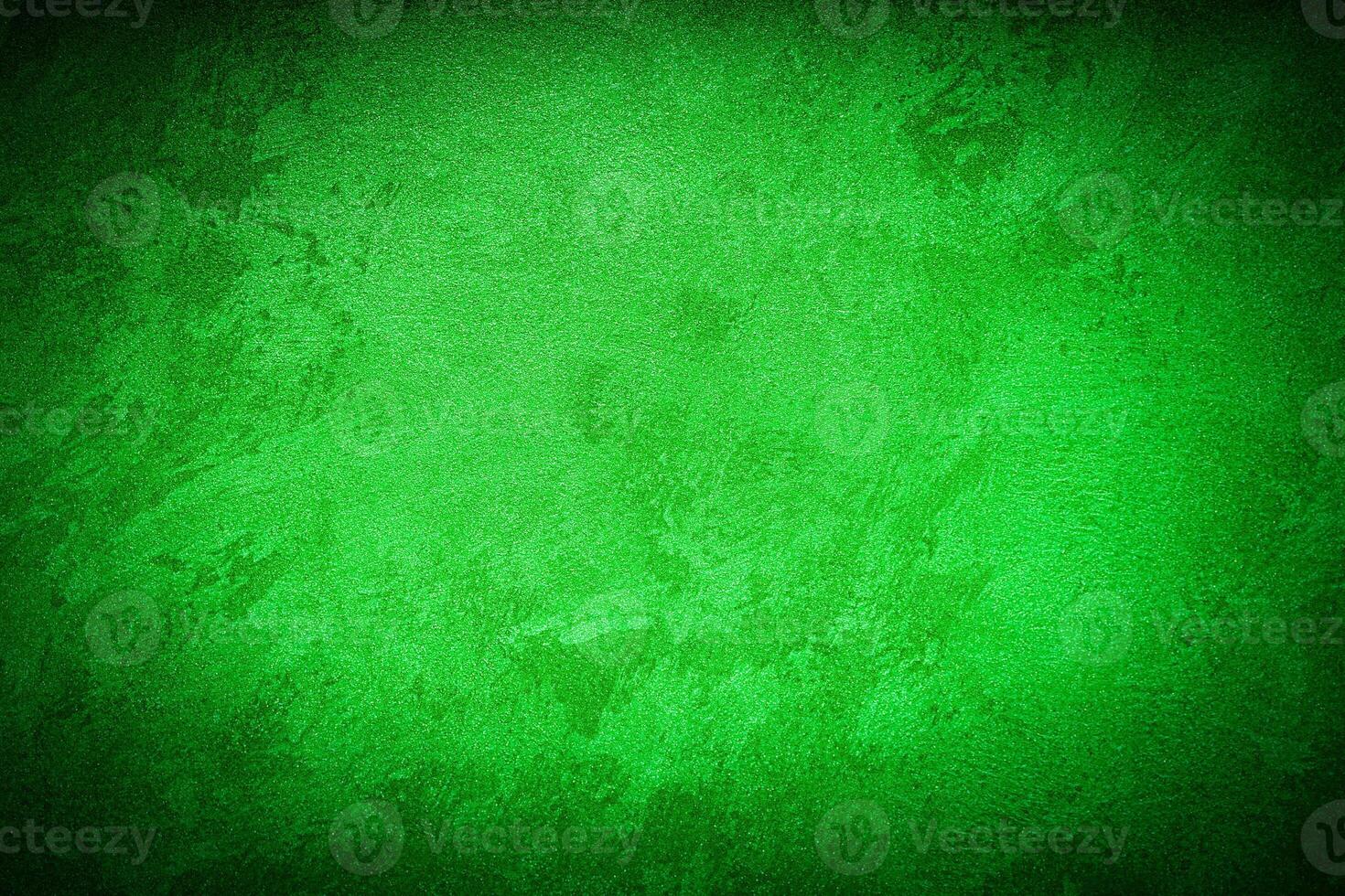 Texture of green decorative plaster or concrete with vignette. photo
