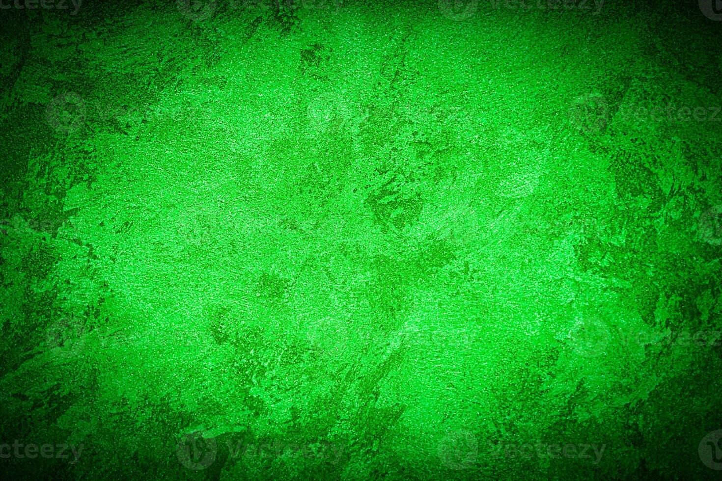 Texture of green decorative plaster or concrete with vignette. photo
