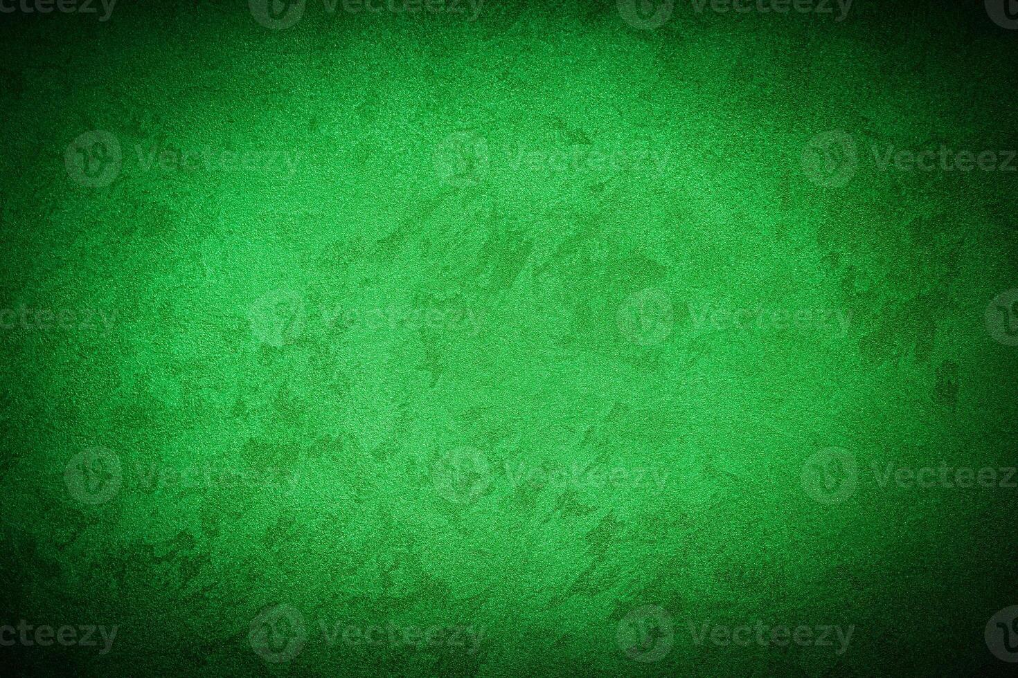 Texture of green decorative plaster or concrete with vignette. photo