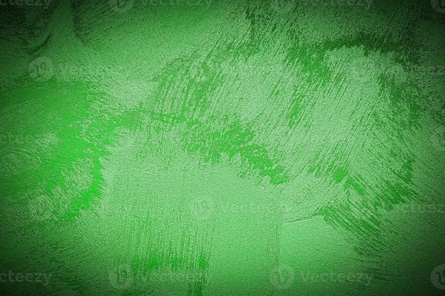 Texture of green decorative plaster or concrete with vignette. photo