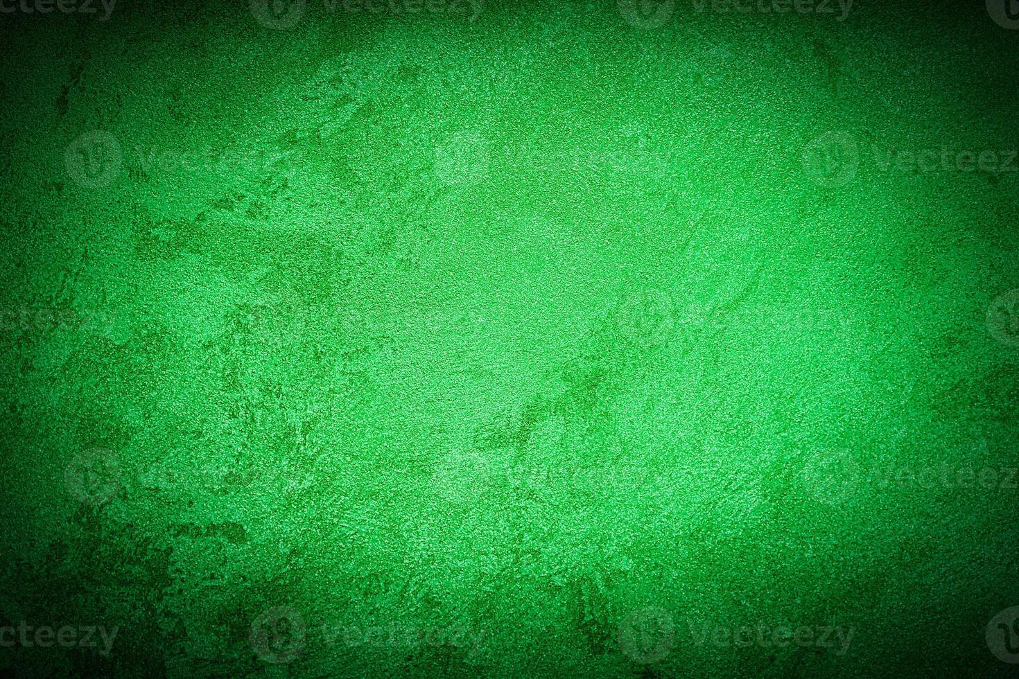 Texture of green decorative plaster or concrete with vignette. photo