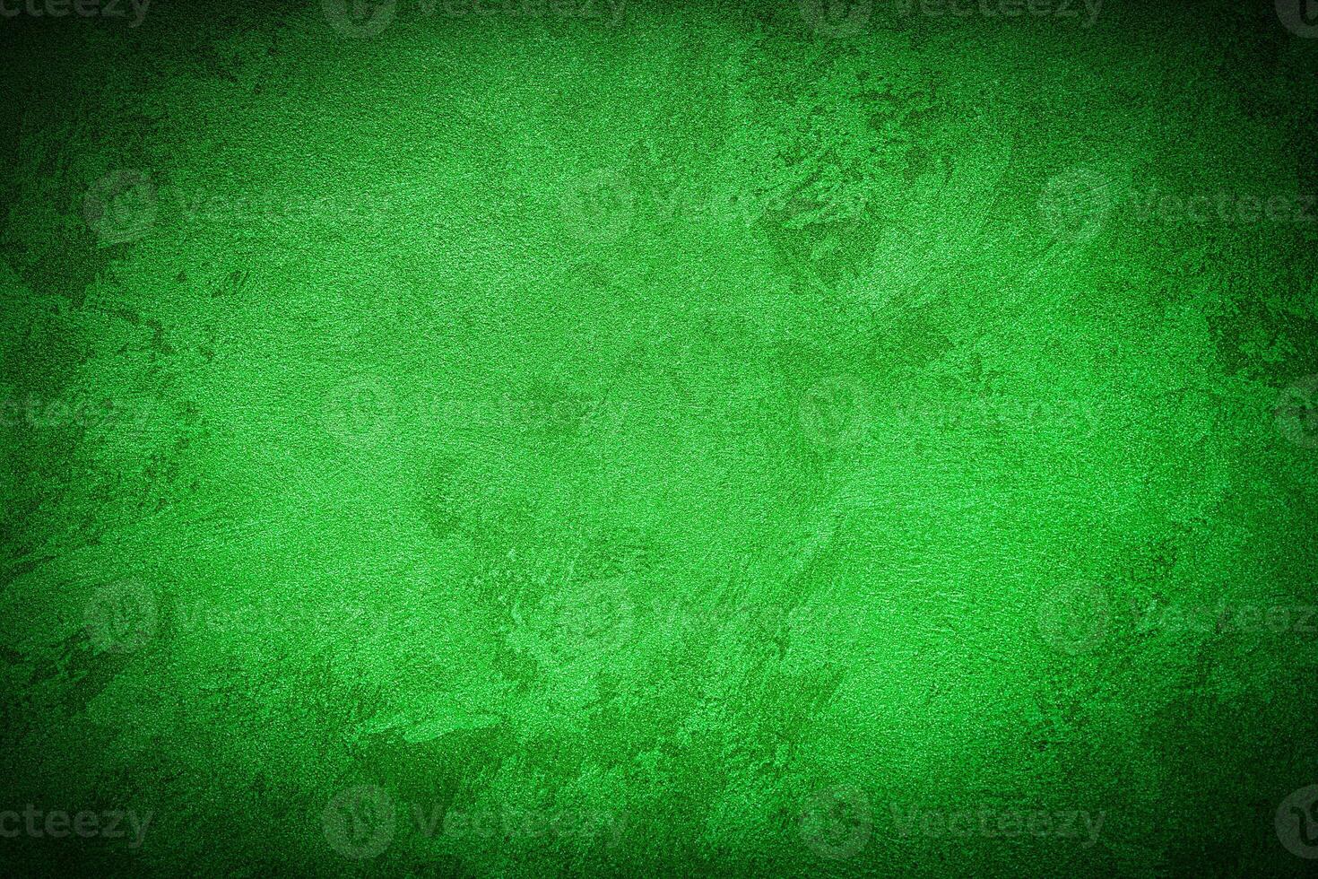 Texture of green decorative plaster or concrete with vignette. photo