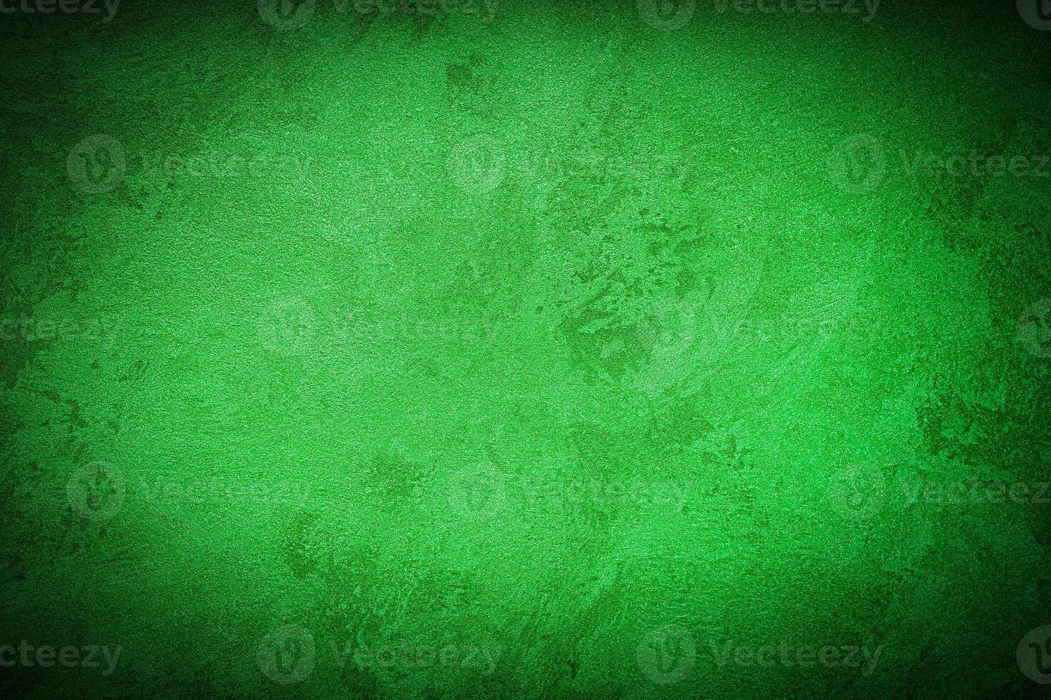 Texture of green decorative plaster or concrete with vignette. photo