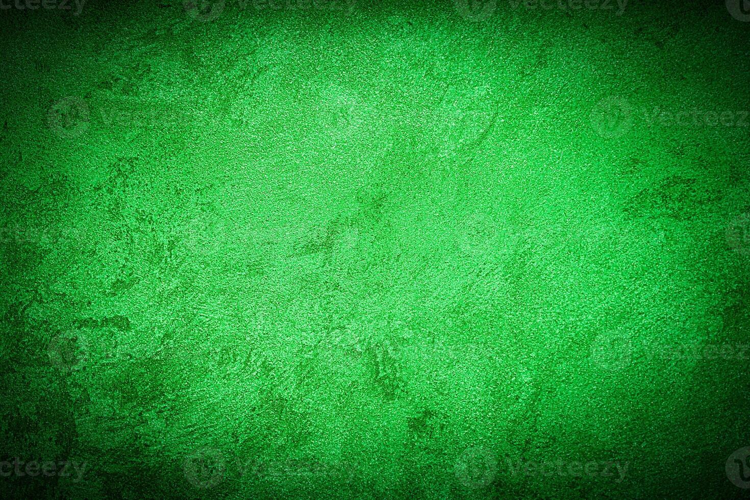 Texture of green decorative plaster or concrete with vignette. photo