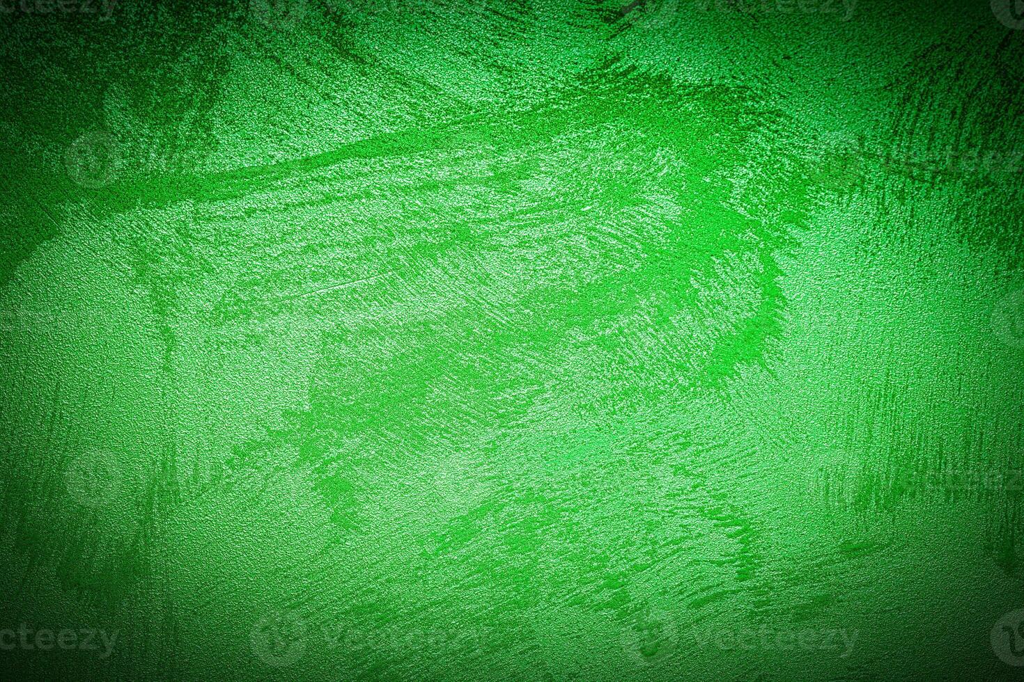 Texture of green decorative plaster or concrete with vignette. photo