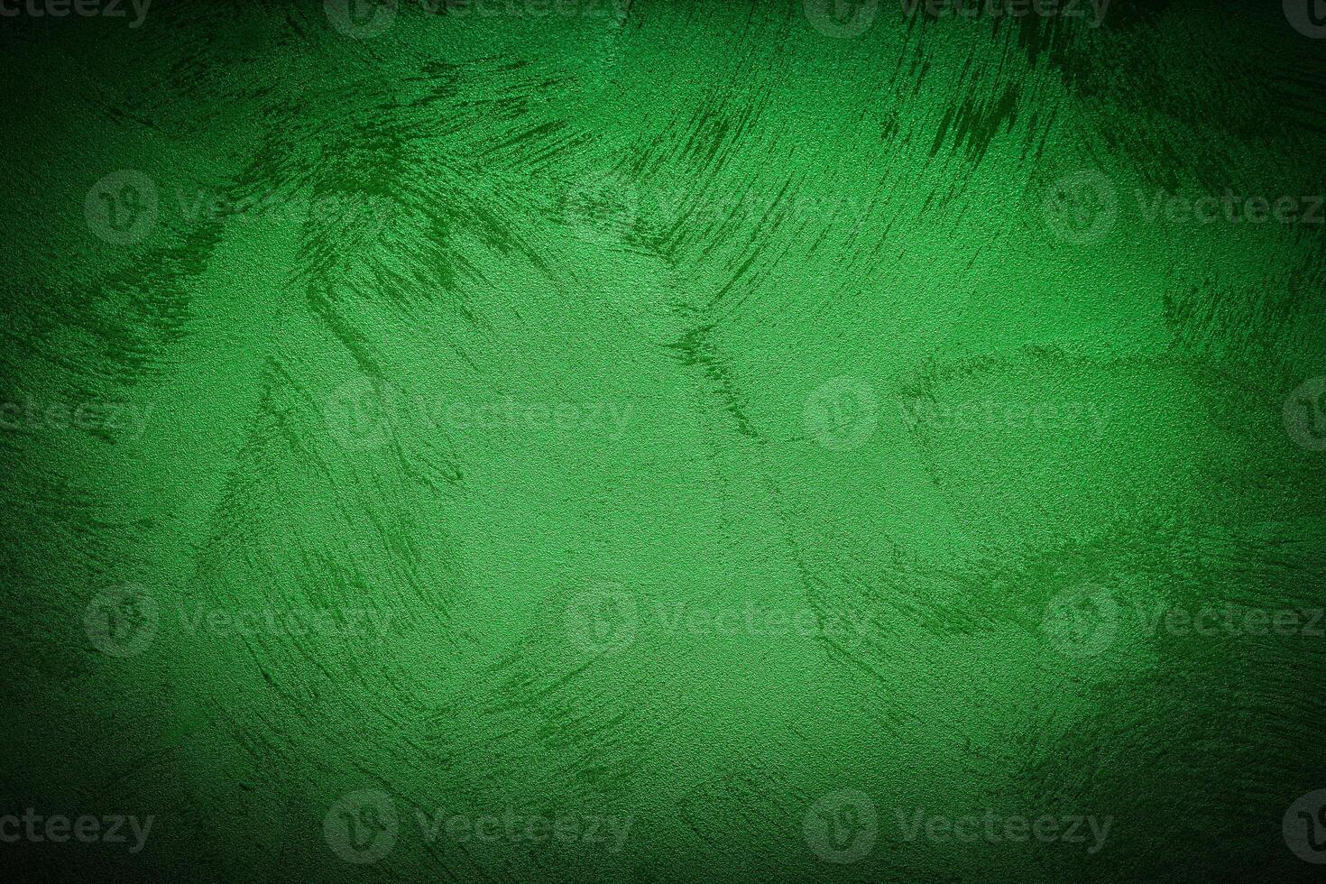 Texture of green decorative plaster or concrete with vignette. photo
