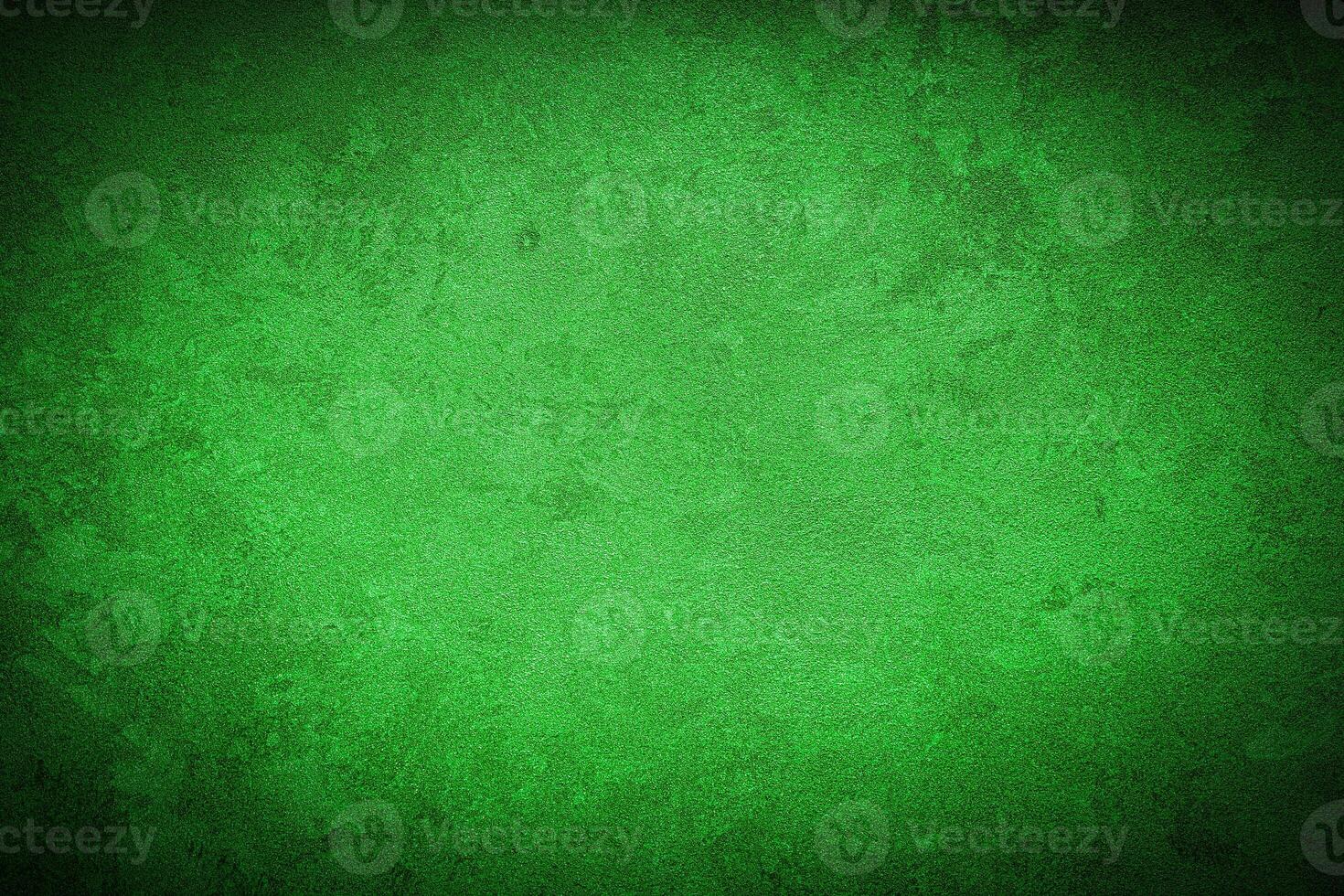 Texture of green decorative plaster or concrete with vignette. photo