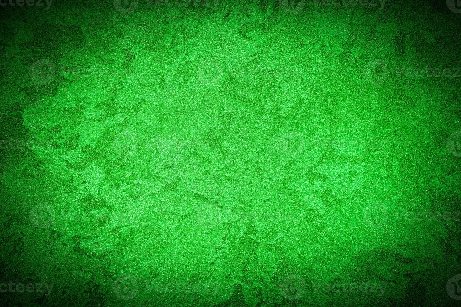Texture of green decorative plaster or concrete with vignette. photo