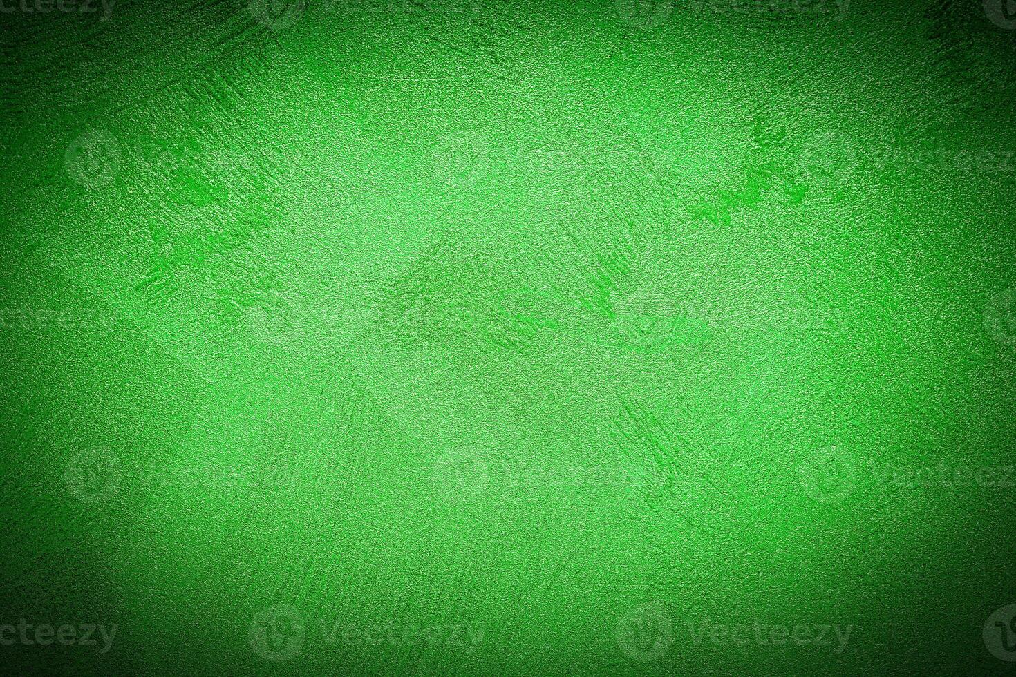 Texture of green decorative plaster or concrete with vignette. photo
