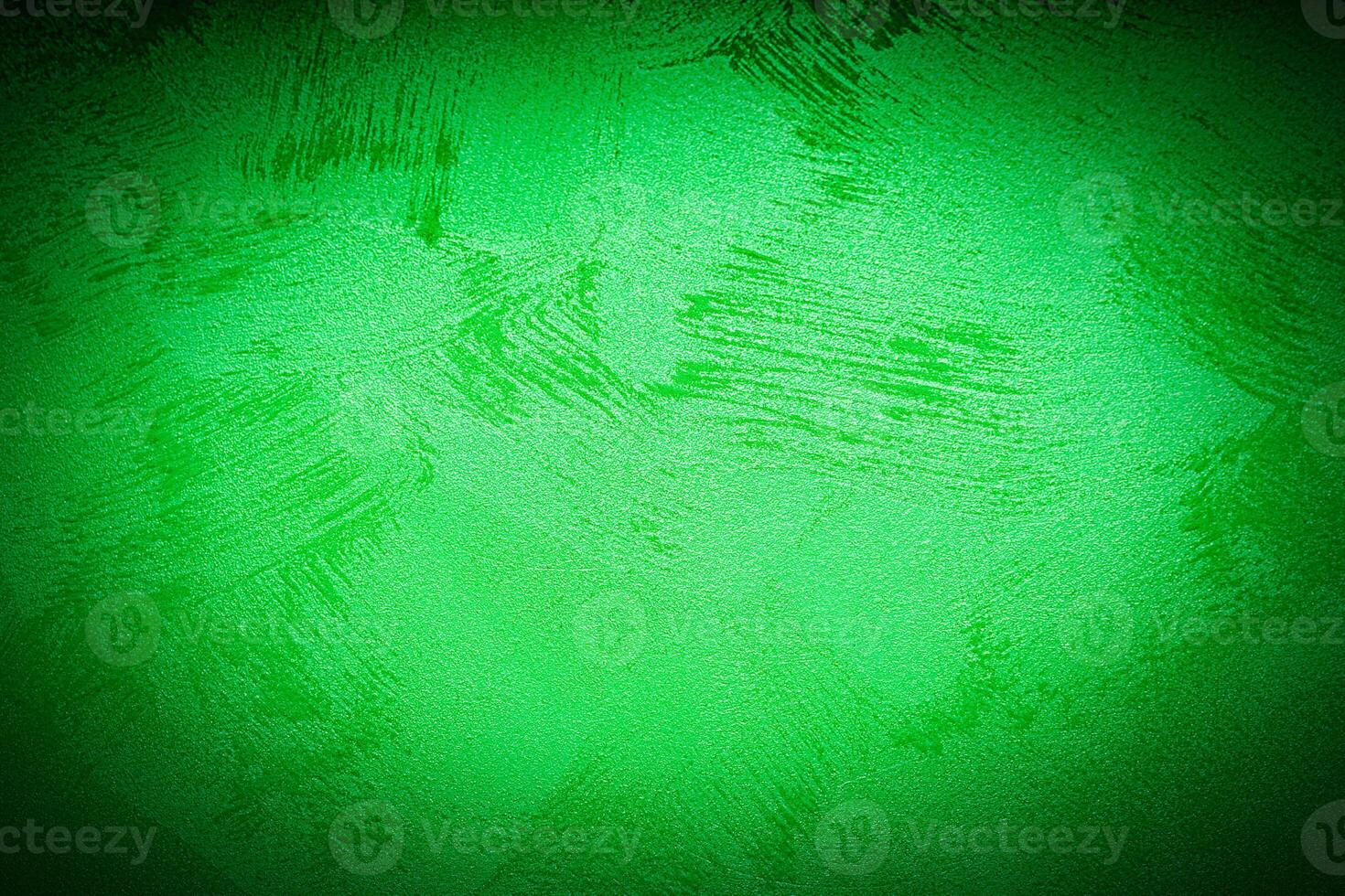 Texture of green decorative plaster or concrete with vignette. photo