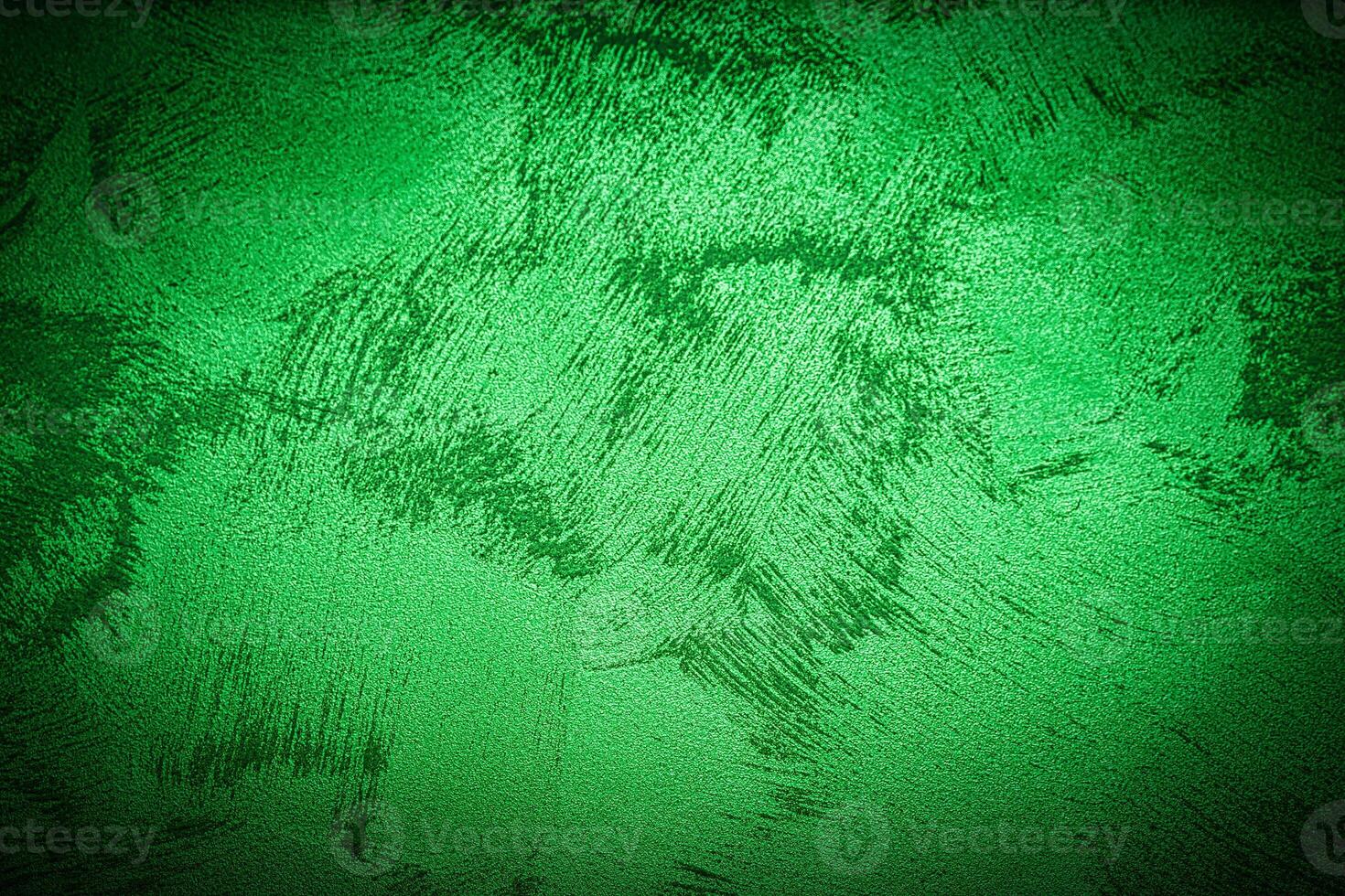 Texture of green decorative plaster or concrete with vignette. photo
