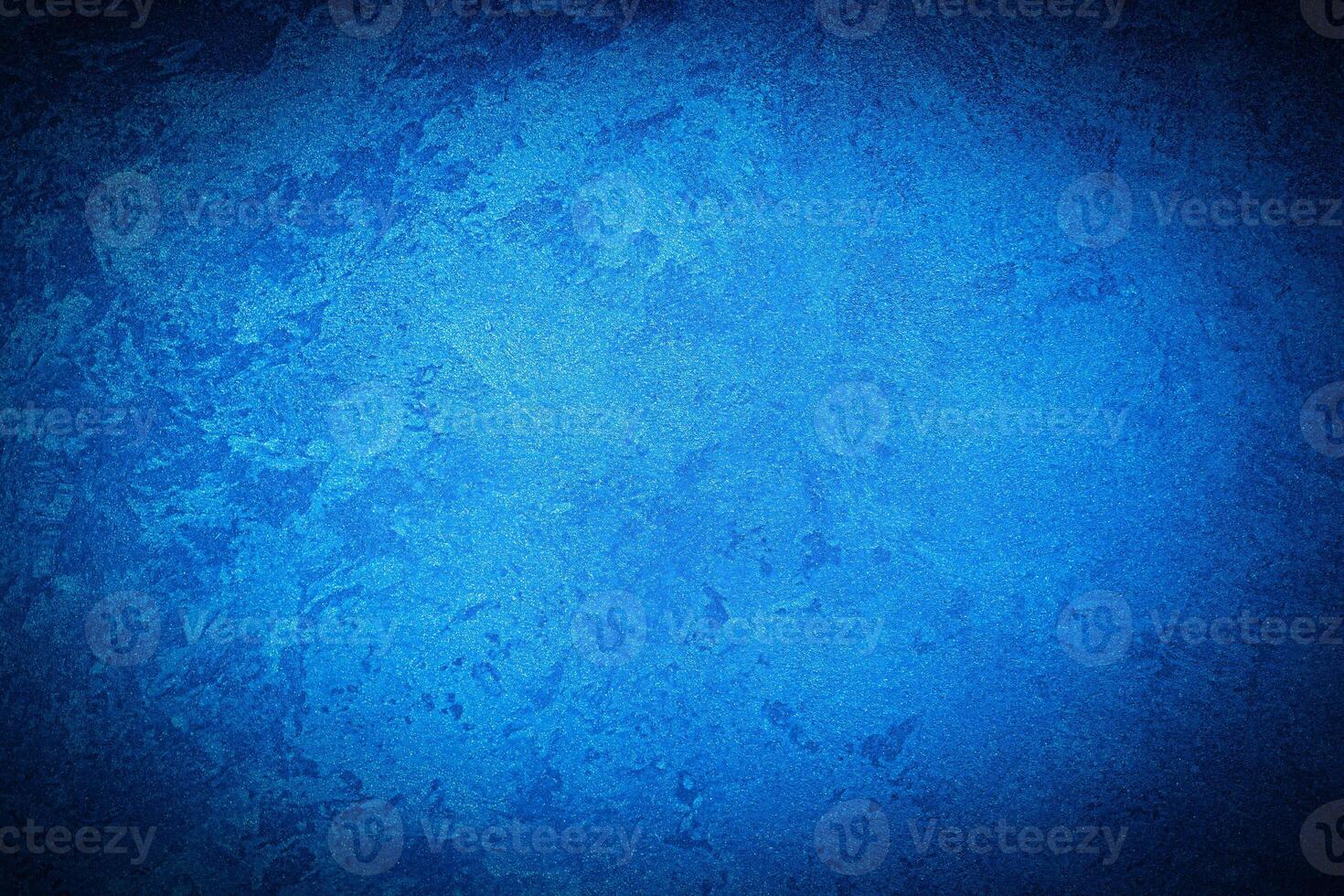 Texture of blue decorative plaster or concrete with vignette. photo