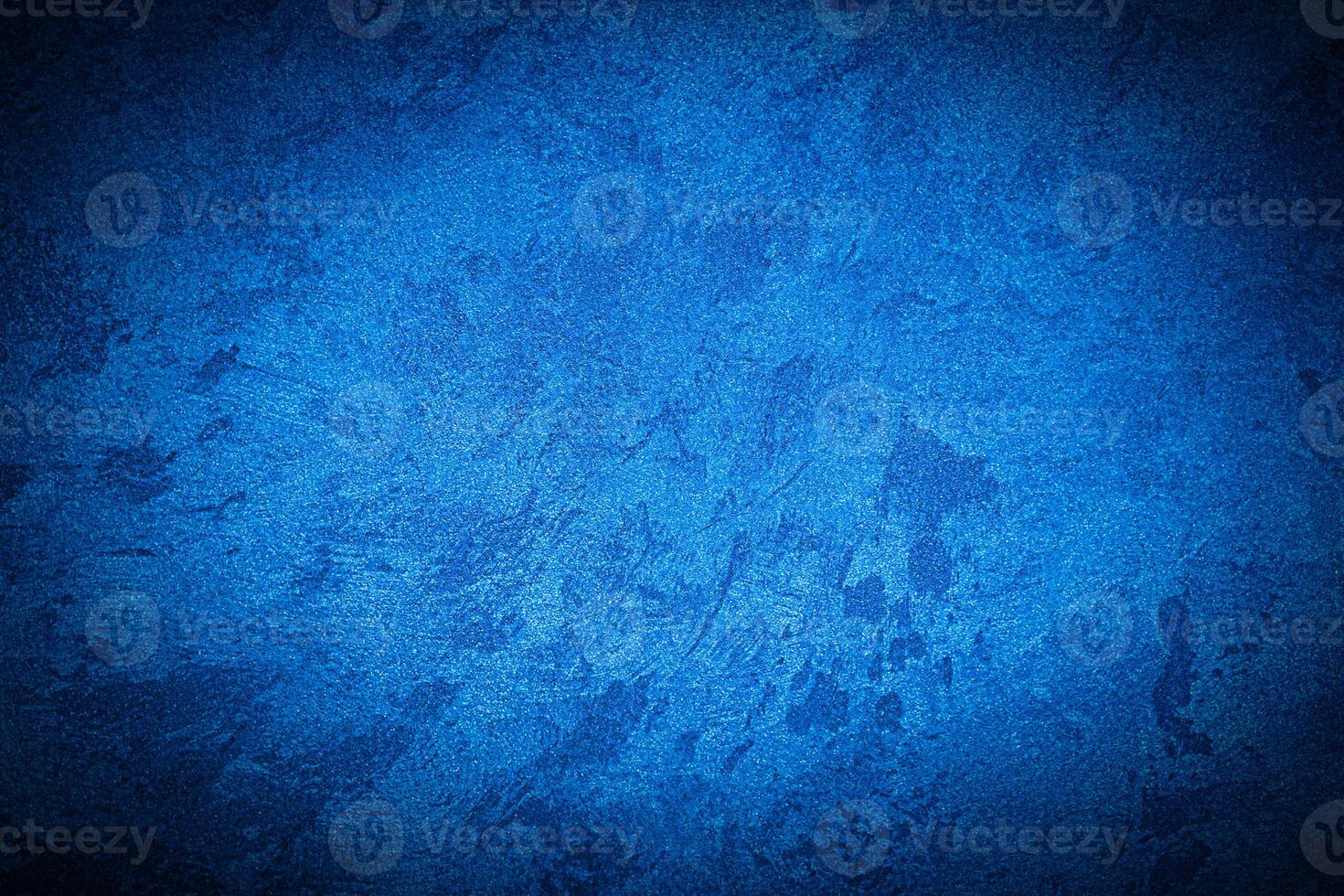 Texture of blue decorative plaster or concrete with vignette. photo