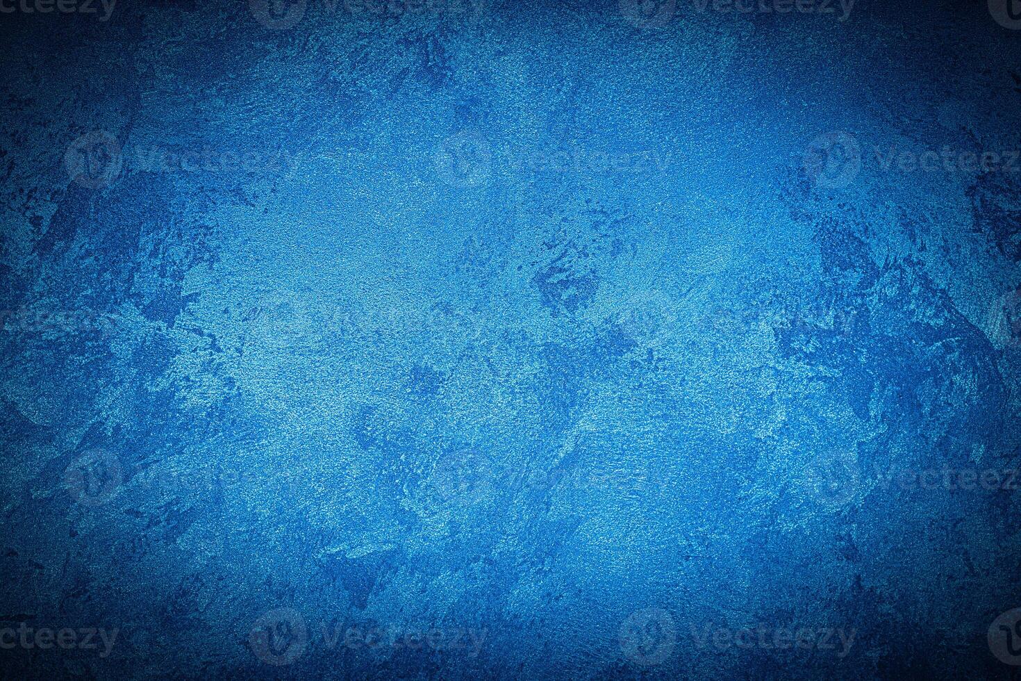 Texture of blue decorative plaster or concrete with vignette. photo